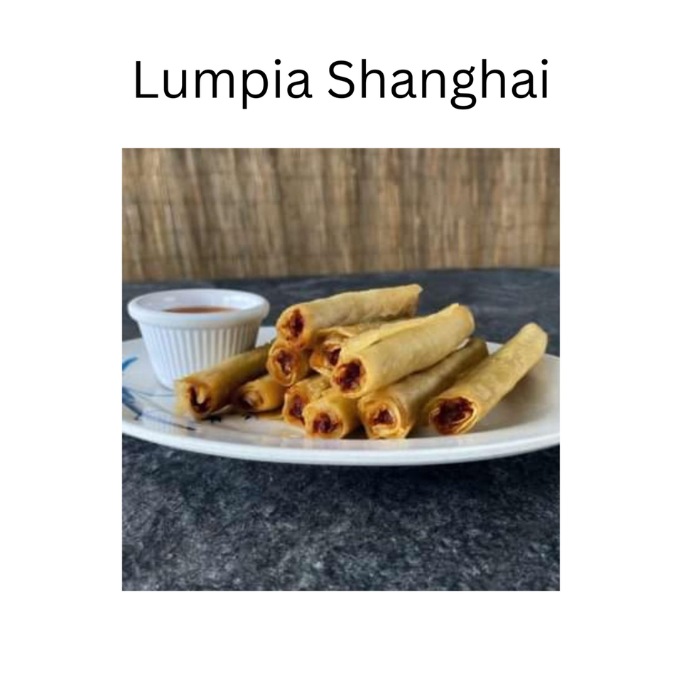 A plate of golden-brown Filipino Lumpia Shanghai spring rolls with a side of dipping sauce.